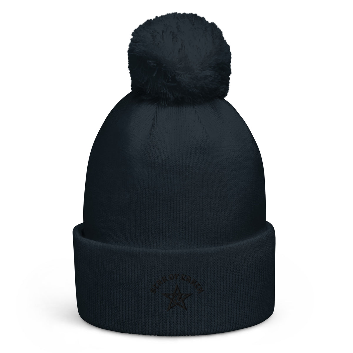 Pom pom beanie in donkerblauw met een zachte pompoms bovenop, perfect voor koude herfst- en winterdagen.
